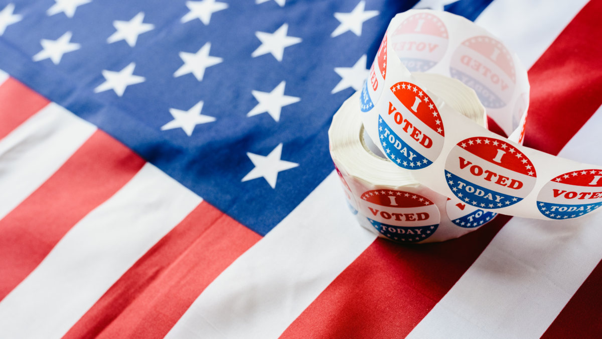 american flag and Vote stickers
